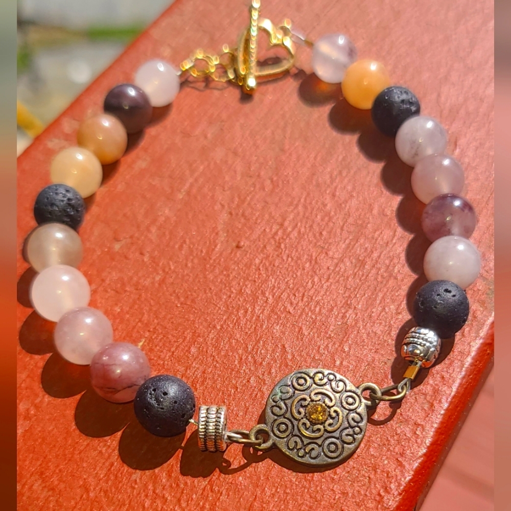 Purple colored agate with lava rock crystal bracelet